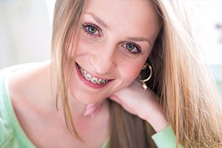 Girl with braces smiling